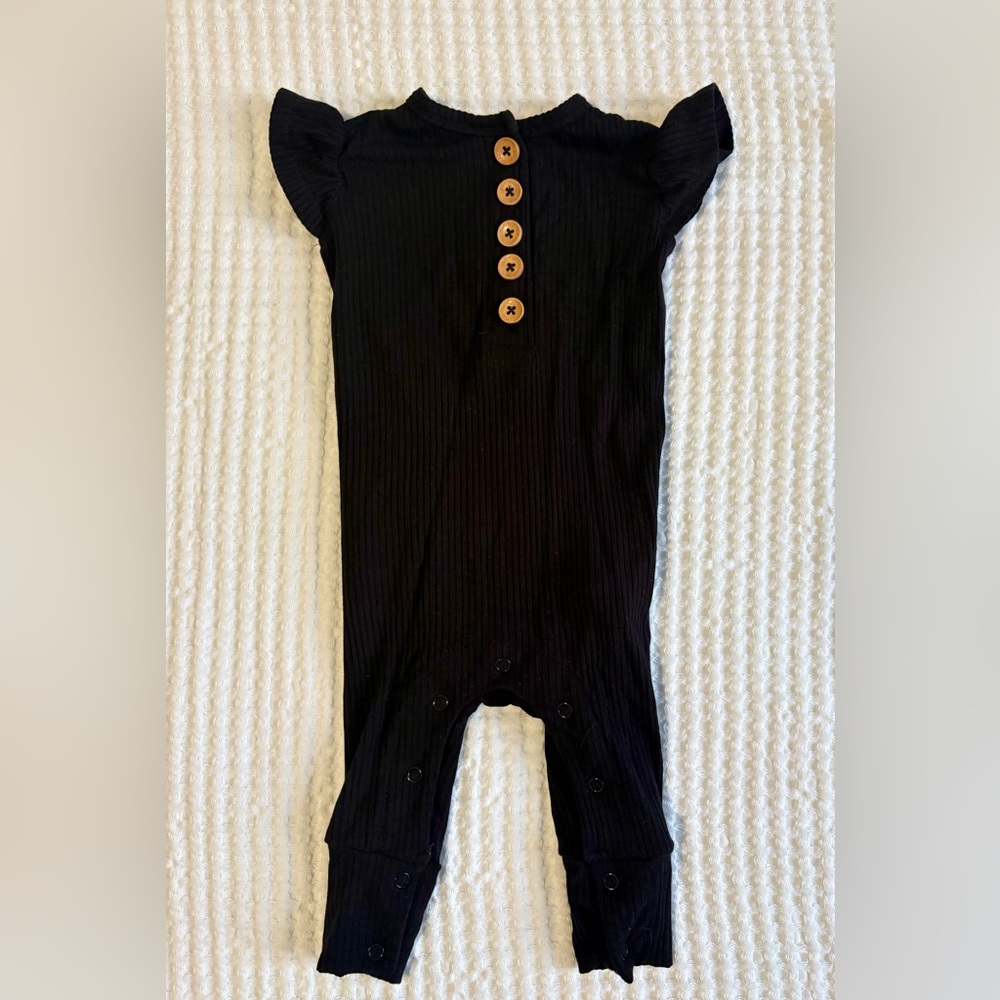 Posh Peanut Girl’s Black Ribbed Ruffled Cap Sleeve Henley Romper, 3-6M